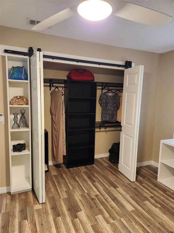 211 Thorntree Place Brandon, FL 33510 - Photo 11 of 16 a view of walk in closet with clothes and shoes
