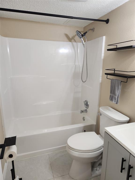 211 Thorntree Place Brandon, FL 33510 - Photo 12 of 16 a bathroom with a shower a toilet and a shower