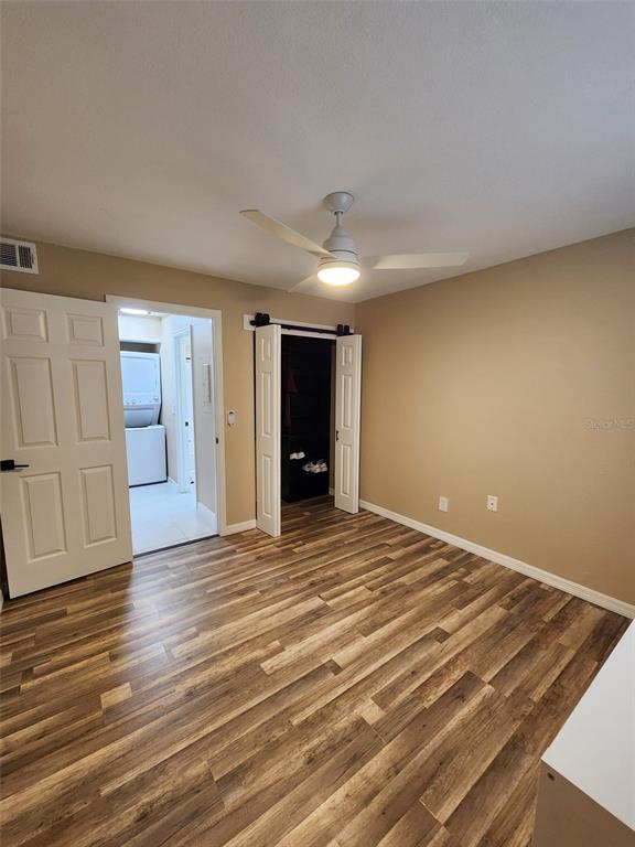 211 Thorntree Place Brandon, FL 33510 - Photo 13 of 16 a view of an empty room with wooden floor