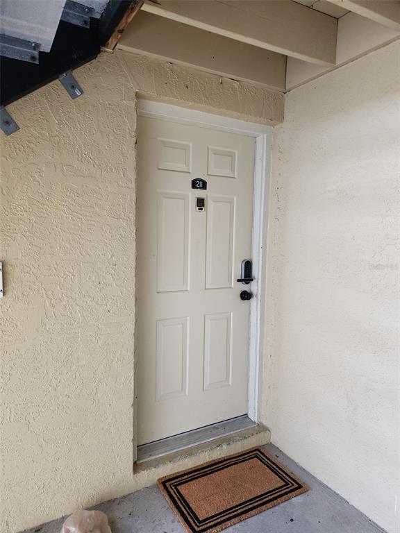 211 Thorntree Place Brandon, FL 33510 - Photo 3 of 16 a view of a room with wooden floor