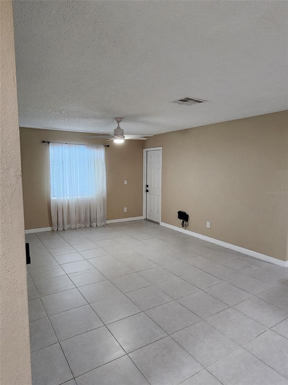211 Thorntree Place Brandon, FL 33510 - Photo 4 of 16 an empty room with a empty space and windows