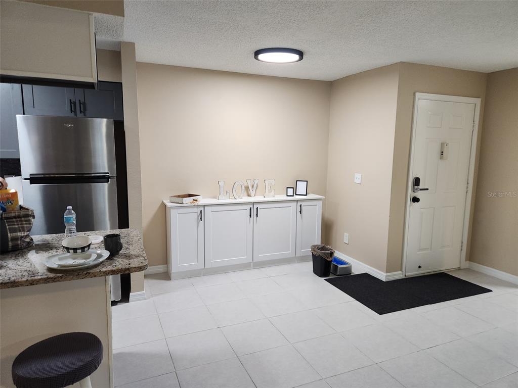 211 Thorntree Place Brandon, FL 33510 - Photo 6 of 16 a kitchen with a sink cabinets and appliances