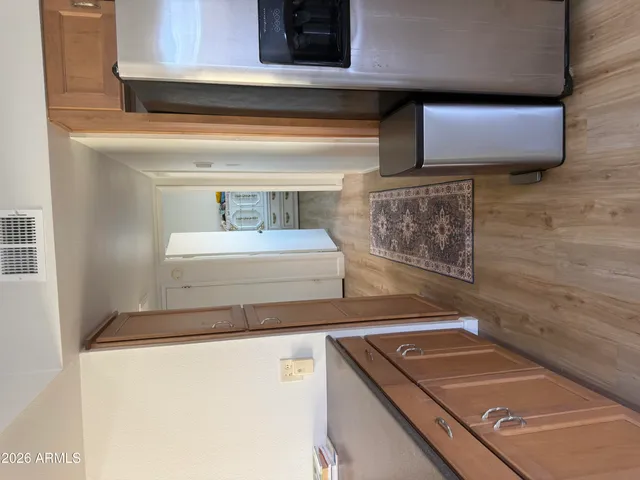 a utility room with washer and dryer