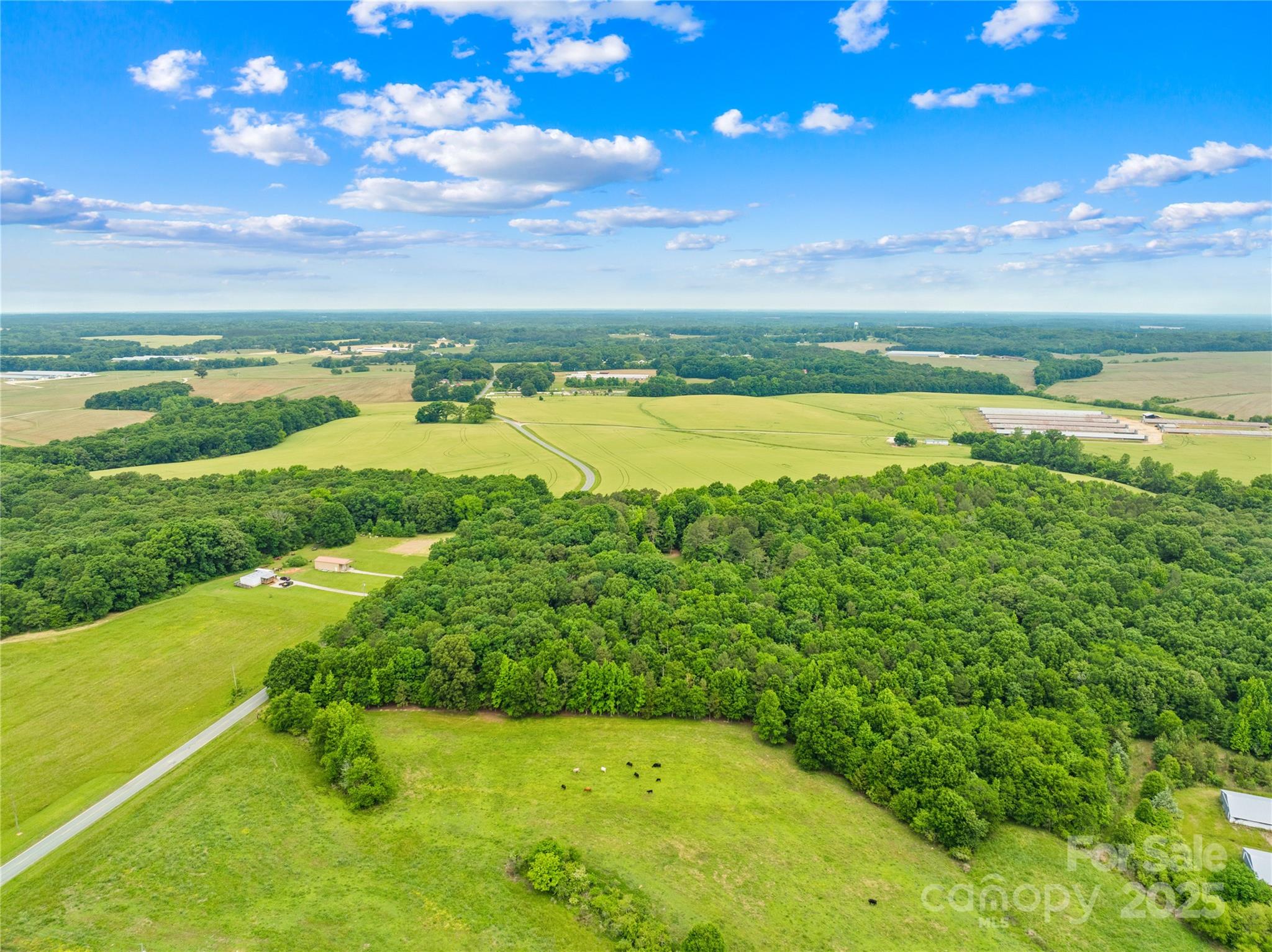 18-ac West M Griffin Road Monroe, NC 28112 - Photo 5 of 12 a view of a swimming pool and an outdoor seating