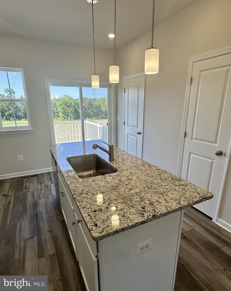 149 Swan Fld Avenue Ranson, WV 25438 - Photo 15 of 33 a kitchen with stainless steel appliances granite countertop sink stove and refrigerator