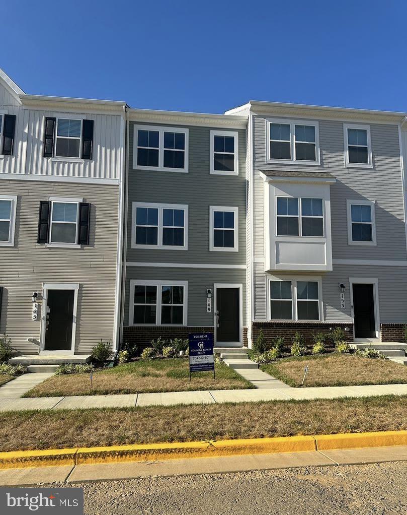 149 Swan Fld Avenue Ranson, WV 25438 - Photo 2 of 33 a front view of a house with a yard