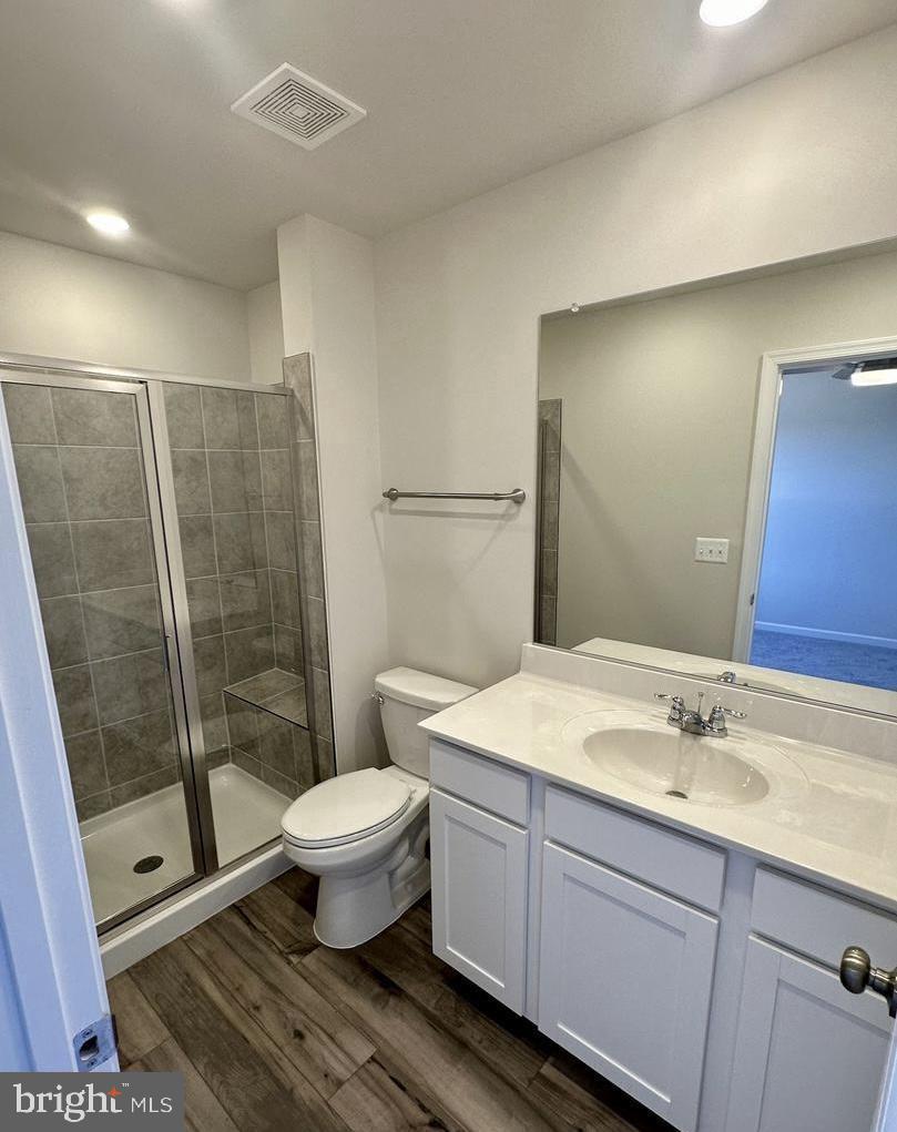 149 Swan Fld Avenue Ranson, WV 25438 - Photo 27 of 33 a bathroom with a sink toilet and shower