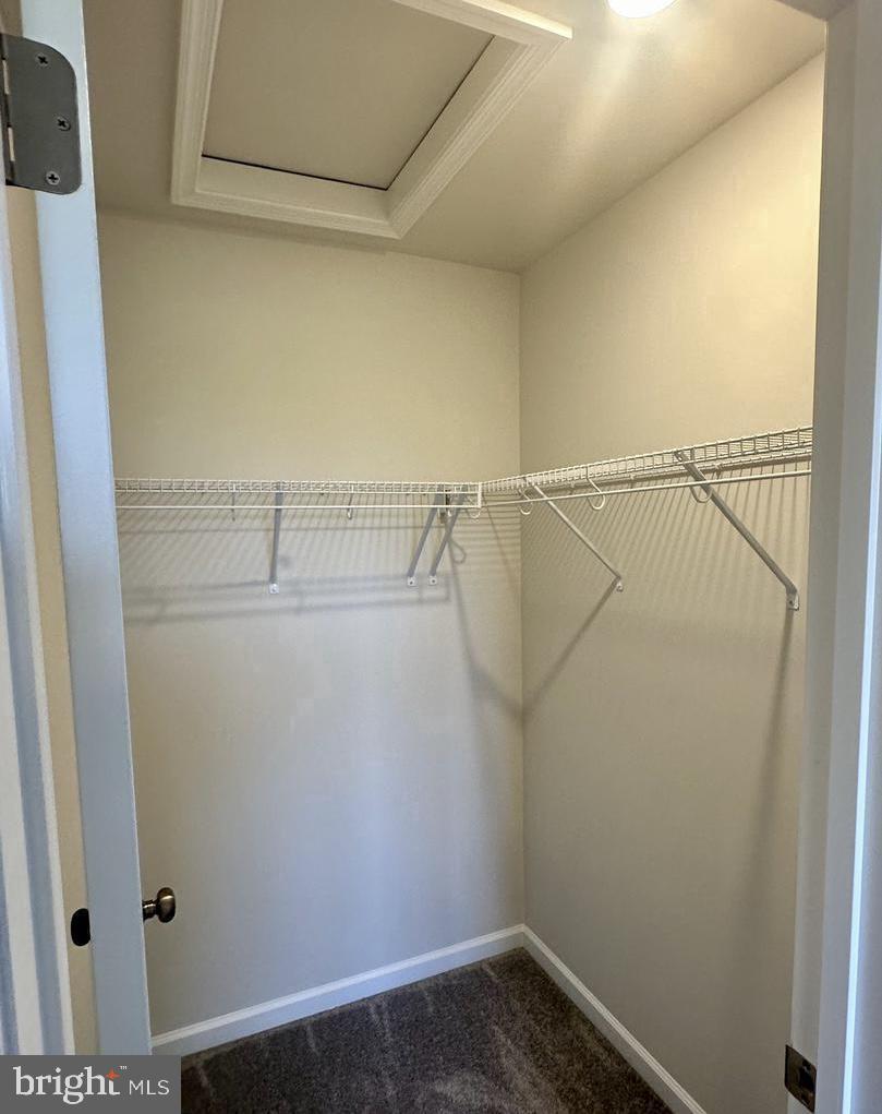 149 Swan Fld Avenue Ranson, WV 25438 - Photo 29 of 33 a view of a room with racks on the wall