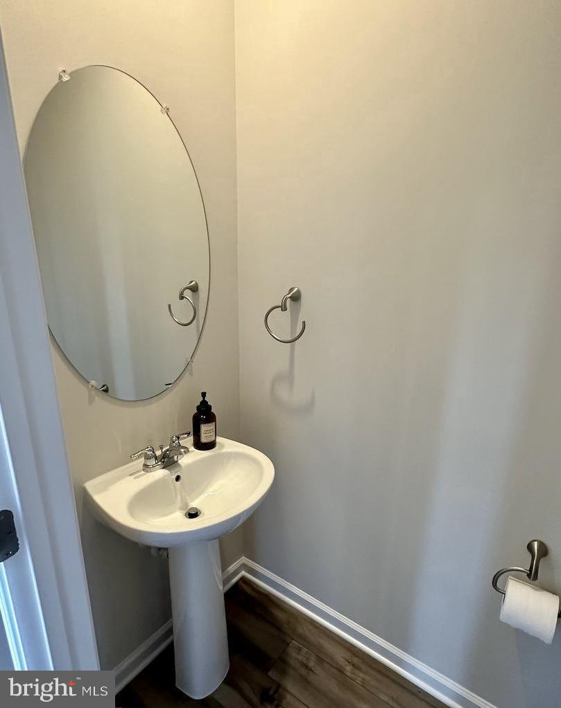 149 Swan Fld Avenue Ranson, WV 25438 - Photo 31 of 33 a bathroom with a sink and mirror