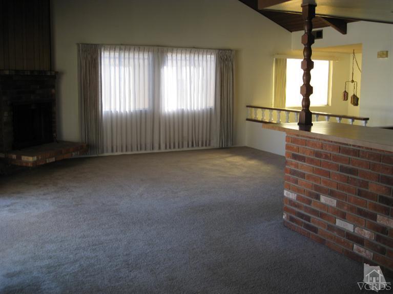 121 Santa Rosa Avenue Oxnard, CA 93035 - Photo 11 of 19 an empty room with windows