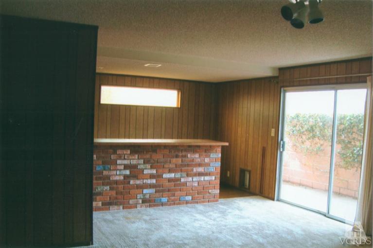 121 Santa Rosa Avenue Oxnard, CA 93035 - Photo 7 of 19 a view of an empty room with a window