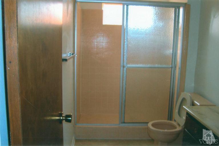 121 Santa Rosa Avenue Oxnard, CA 93035 - Photo 9 of 19 a bathroom with a toilet and a shower
