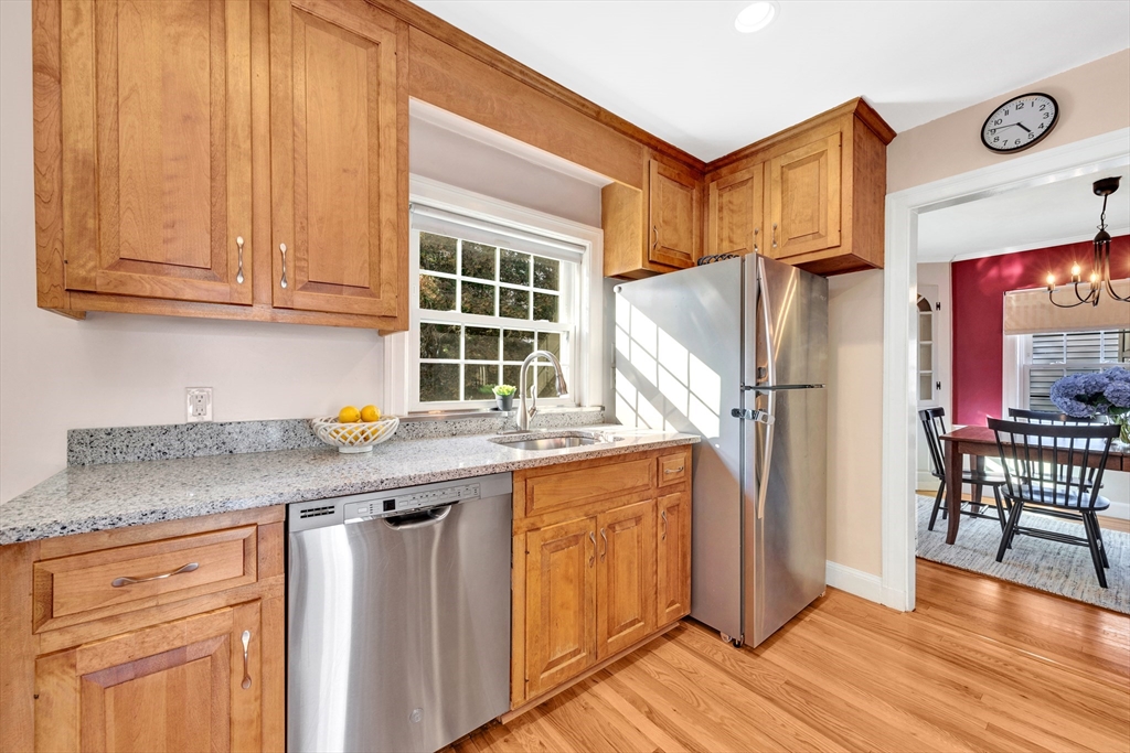 319 Appleton Street Arlington, MA 02476 - Photo 14 of 39 a kitchen with stainless steel appliances granite countertop a refrigerator and a stove top oven