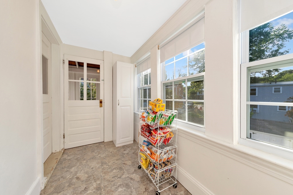 319 Appleton Street Arlington, MA 02476 - Photo 17 of 39 a view of an empty room with a window