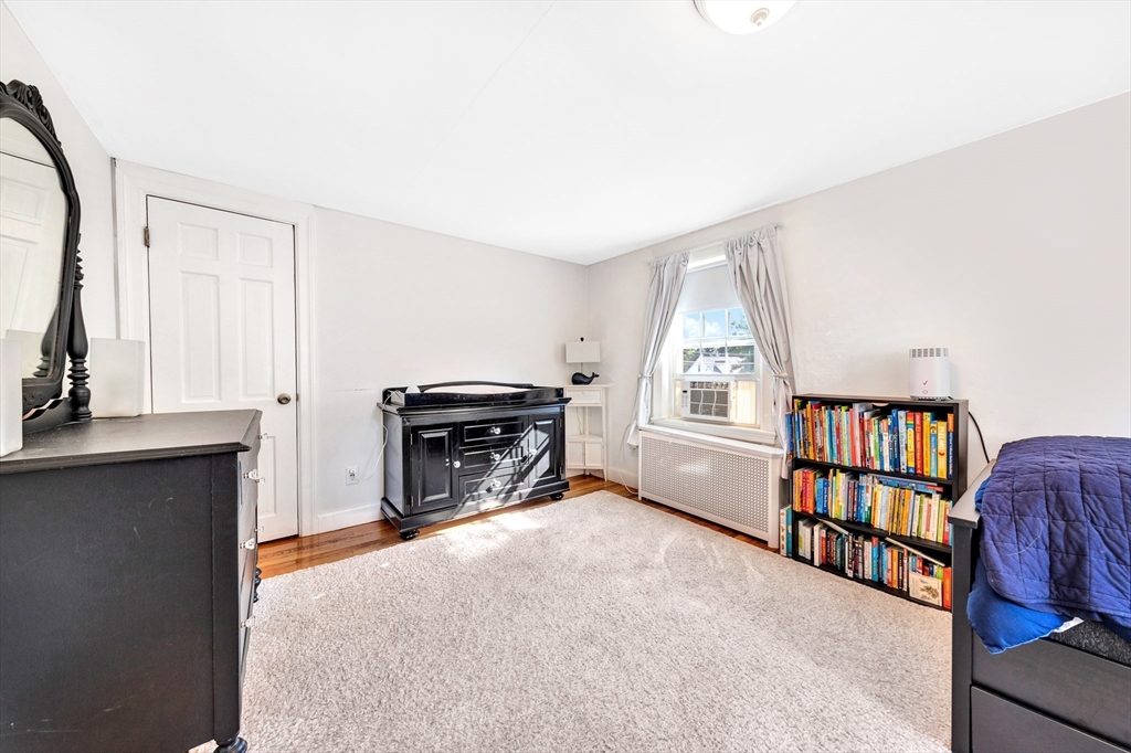 319 Appleton Street Arlington, MA 02476 - Photo 24 of 39 a view of a livingroom with furniture and a window