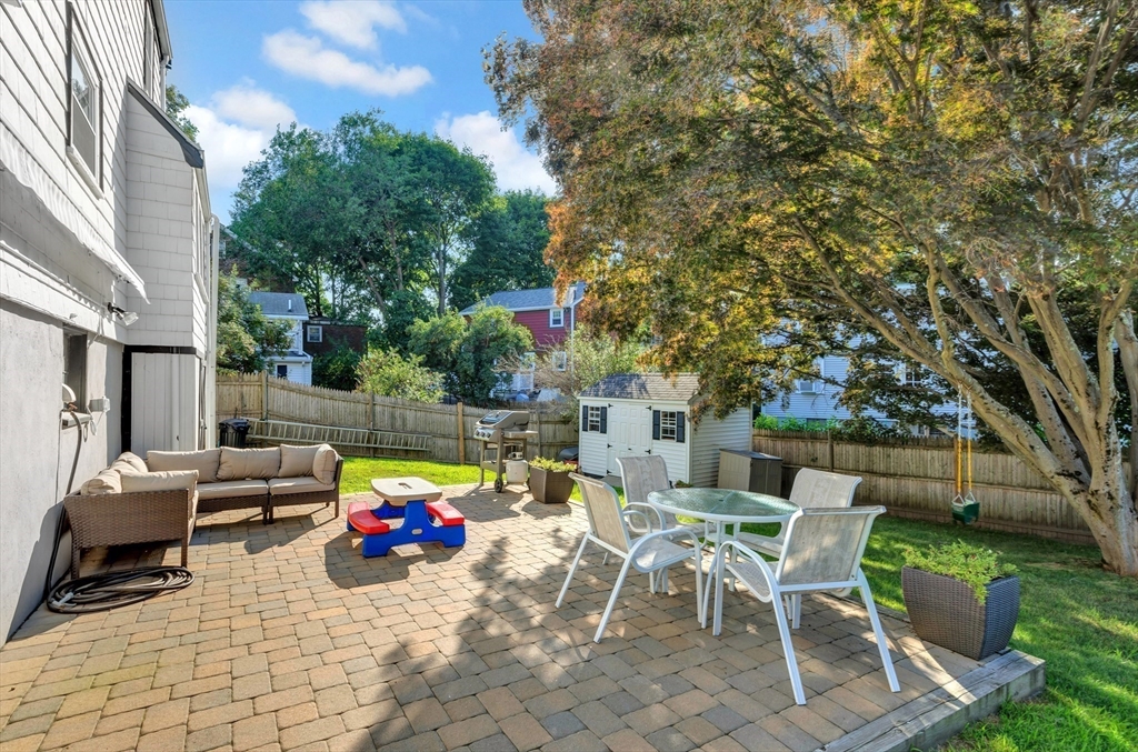 319 Appleton Street Arlington, MA 02476 - Photo 31 of 39 a view of a patio with swimming pool