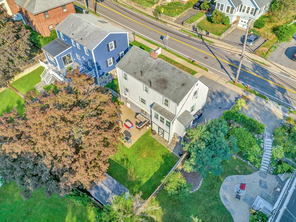 319 Appleton Street Arlington, MA 02476 - Photo 37 of 39 an aerial view of a house with a yard and garden