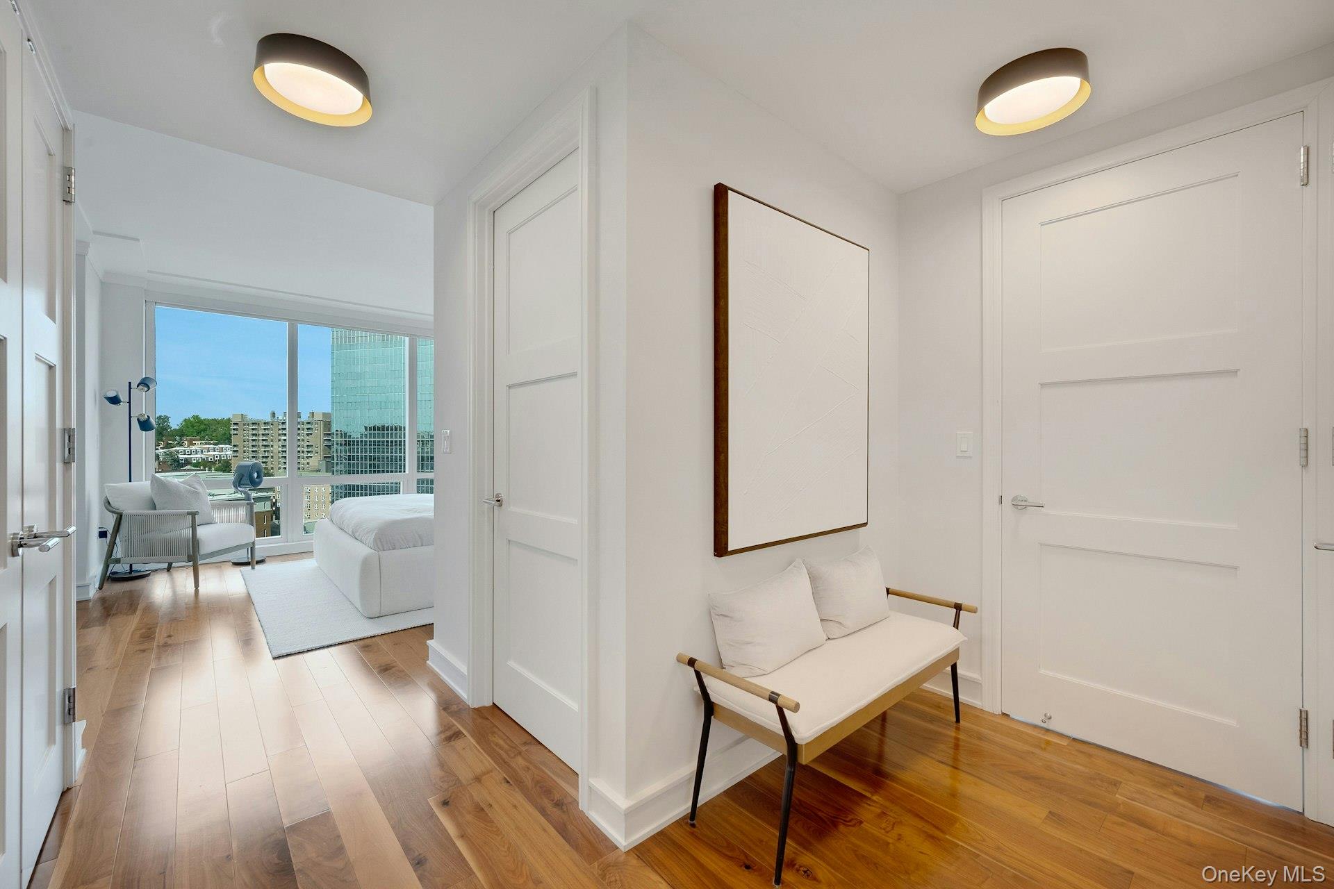 5 Renaissance Square, Unit 12A White Plains, NY 10601 - Photo 19 of 36 a view of a livingroom with furniture and hardwood floor