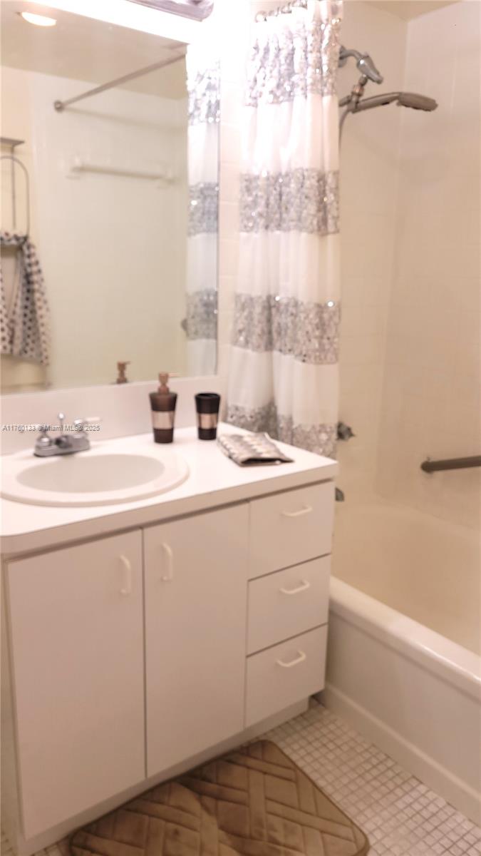 2801 Northeast 183rd Street, Unit 504W Aventura, FL 33160 - Photo 15 of 36 a bathroom with a sink and a mirror