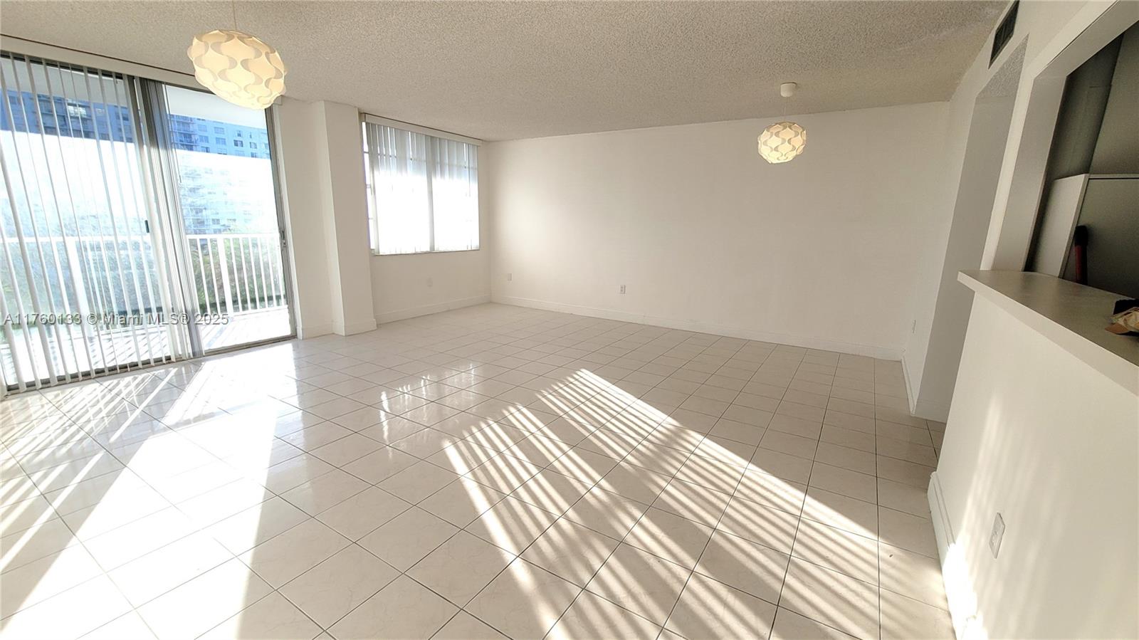 2801 Northeast 183rd Street, Unit 504W Aventura, FL 33160 - Photo 2 of 36 a view of empty room with windows