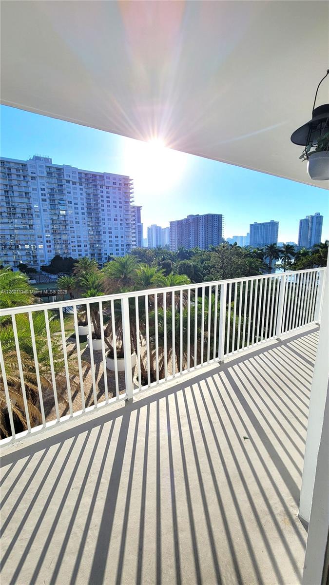 2801 Northeast 183rd Street, Unit 504W Aventura, FL 33160 - Photo 22 of 36 a view of balcony with wooden floor