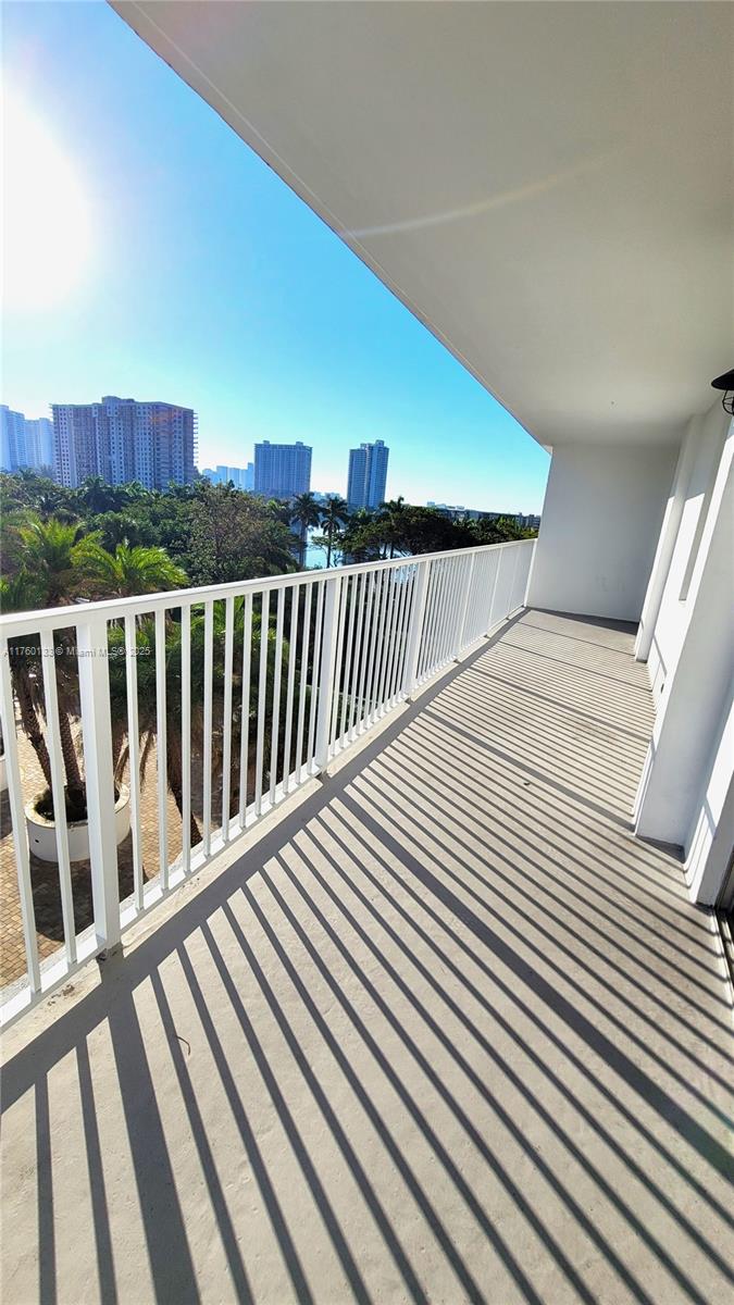 2801 Northeast 183rd Street, Unit 504W Aventura, FL 33160 - Photo 23 of 36 a view of balcony with wooden floor