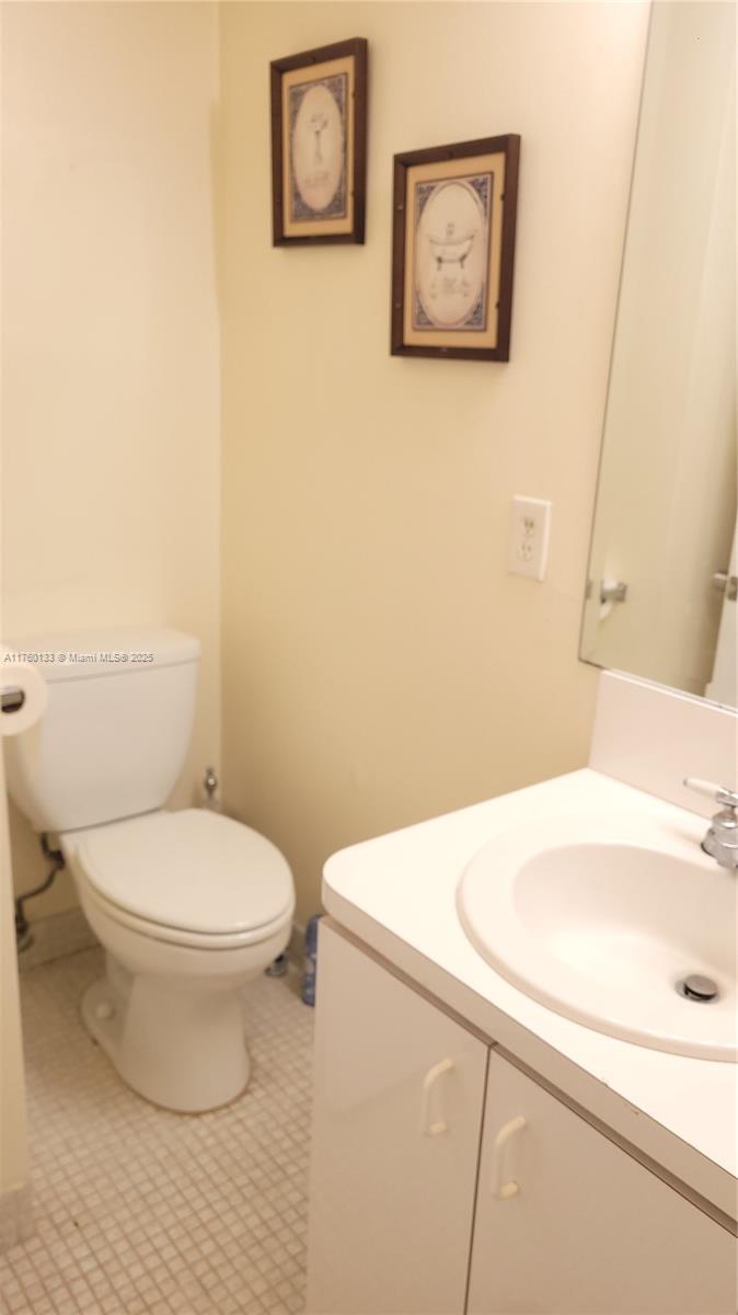 2801 Northeast 183rd Street, Unit 504W Aventura, FL 33160 - Photo 29 of 36 a bathroom with a toilet and a sink
