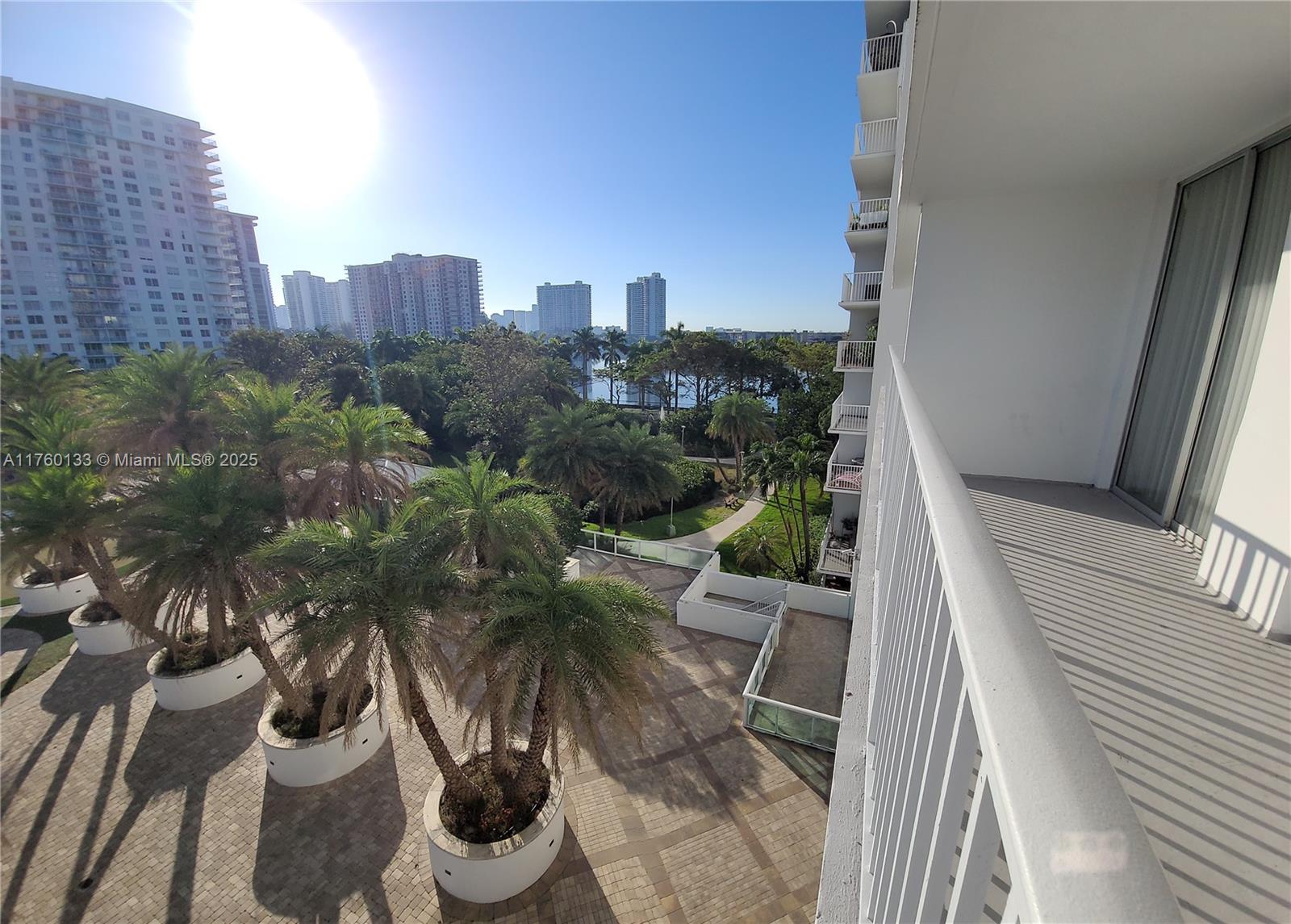 2801 Northeast 183rd Street, Unit 504W Aventura, FL 33160 - Photo 34 of 36 a view of balcony with outdoor seating and city view