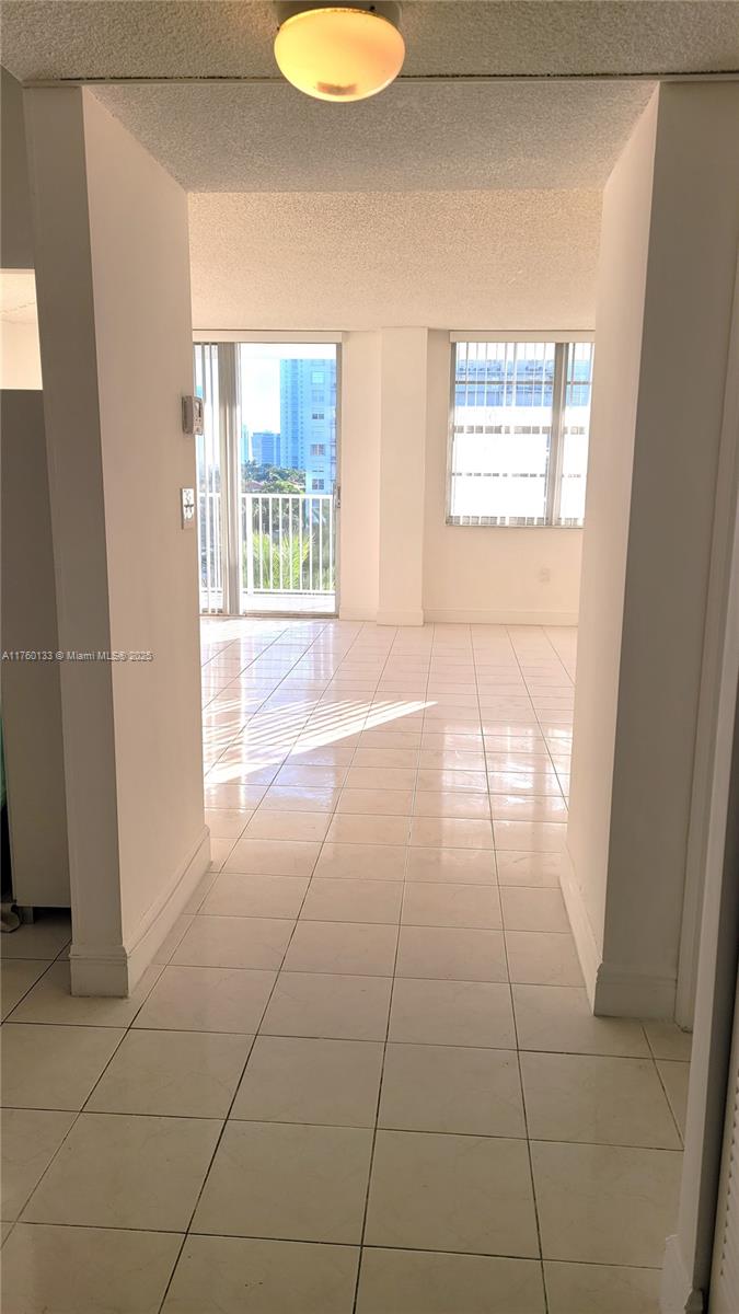 2801 Northeast 183rd Street, Unit 504W Aventura, FL 33160 - Photo 5 of 36 a view of an empty room with a window