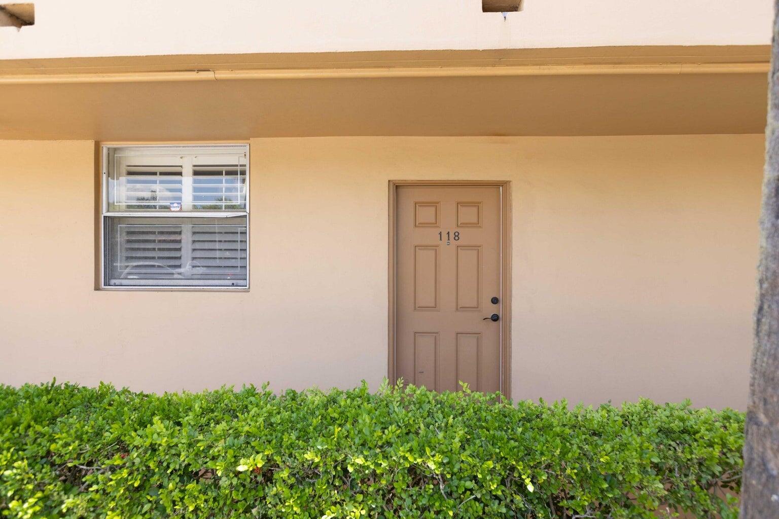 299 Northwest 52nd Terrace, Unit 118 Boca Raton, FL 33487 - Photo 3 of 28 a view of a balcony with an outdoor space