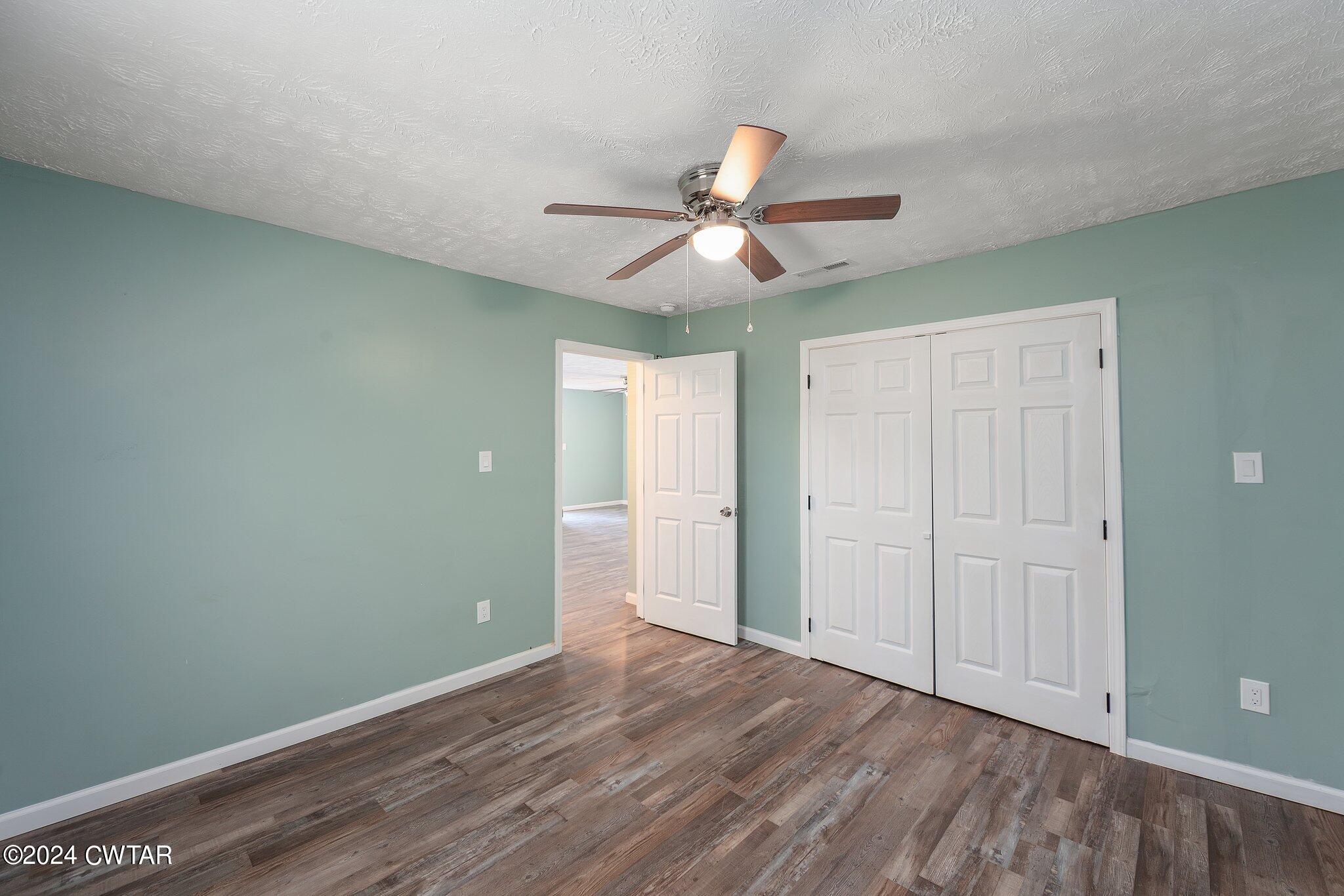 62 Everett Street Jackson, TN 38301 - Photo 19 of 28 wooden floor in an empty room