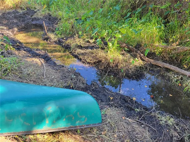 a sign on the side of a road