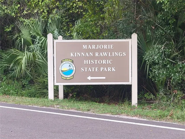 a view of a lake with a park