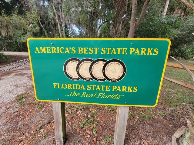 a view of lake with green space