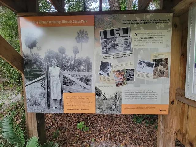 a view of a lake with green space