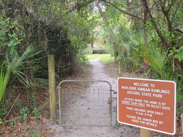 a view of outdoor space with sign board