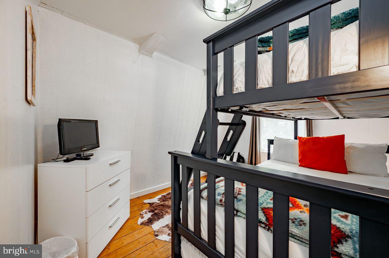 2678 Mayhew Inn Road Oakland, MD 21550 - Photo 23 of 33 Cozy bunk bed retreat for restful nights.