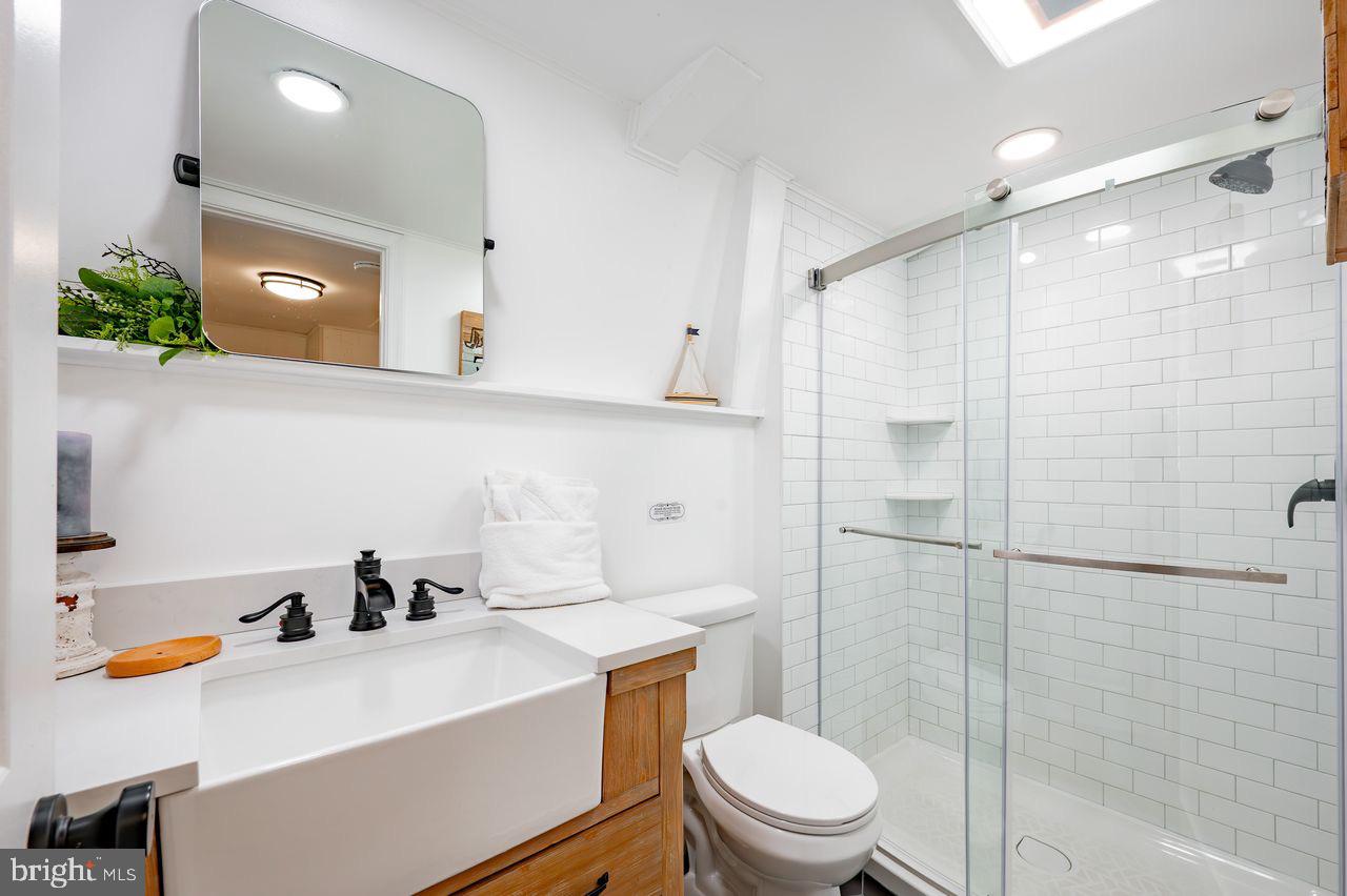 2678 Mayhew Inn Road Oakland, MD 21550 - Photo 30 of 33 Modern bathroom with sleek design elements.