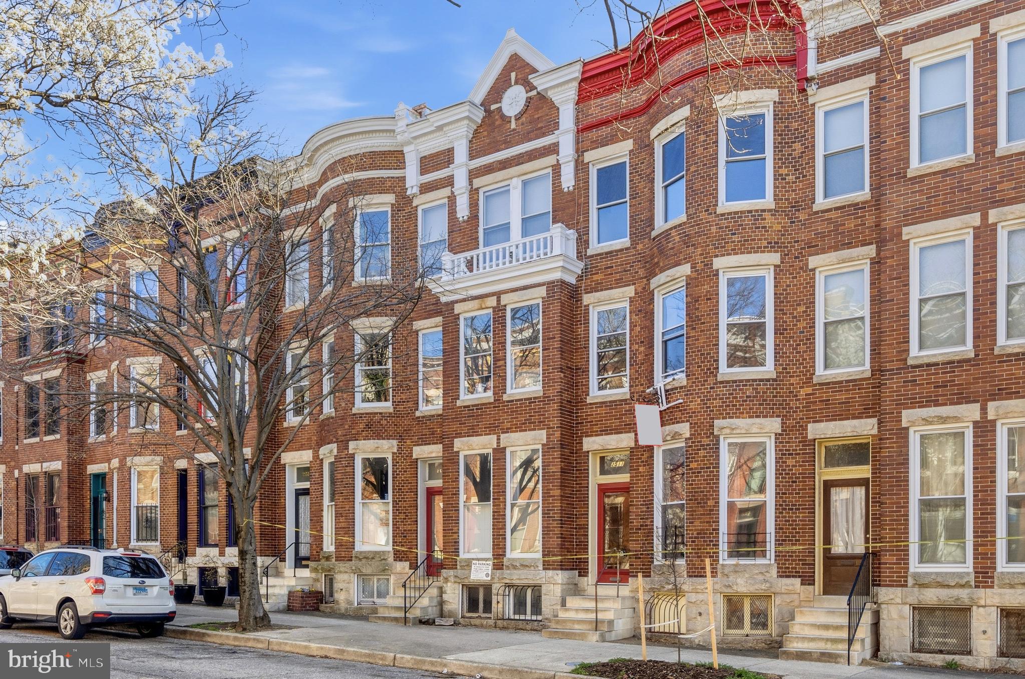 2511 North Calvert Street Baltimore, MD 21218 - Photo 2 of 37 front view of a building with a street