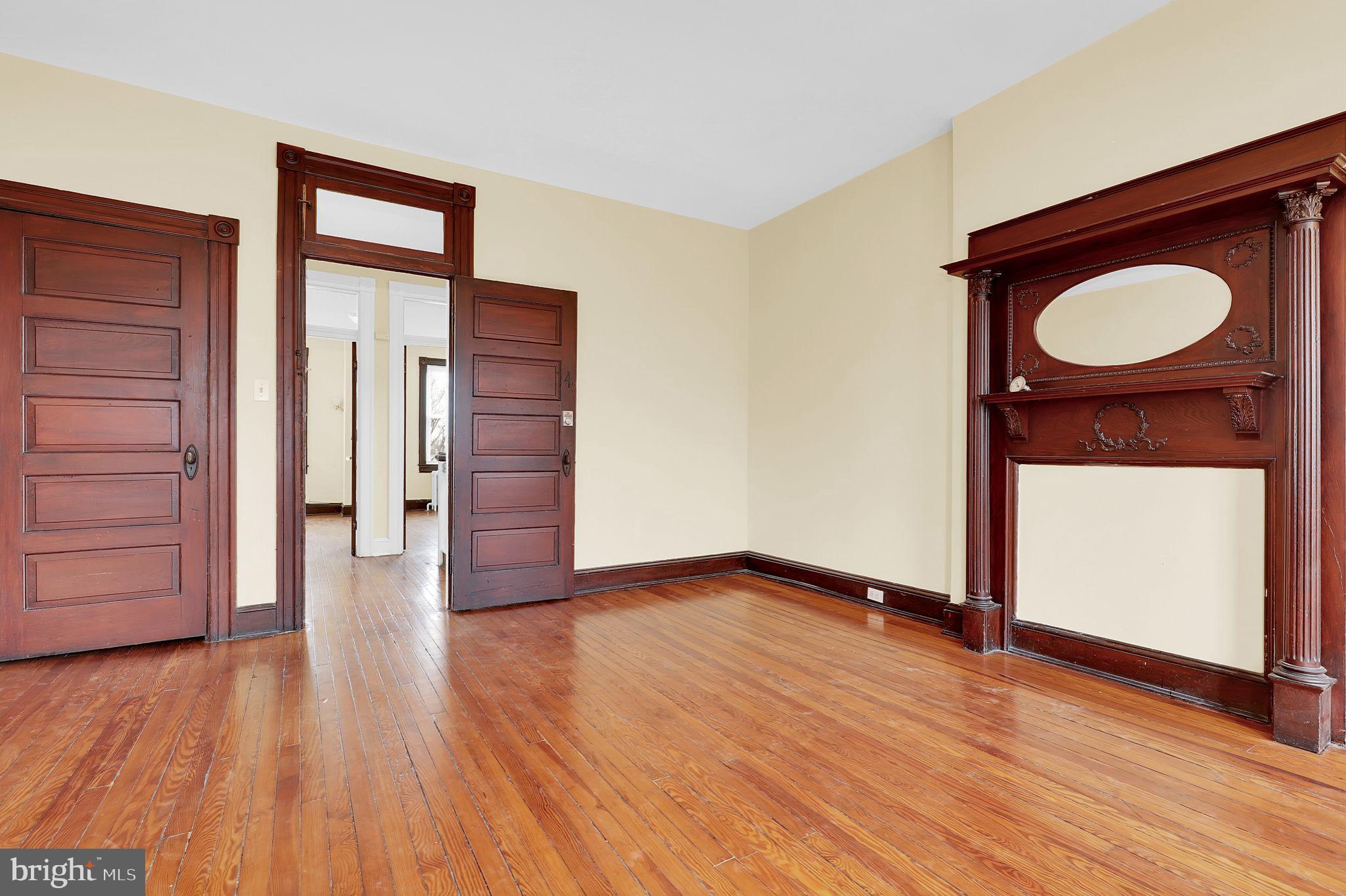 2511 North Calvert Street Baltimore, MD 21218 - Photo 29 of 37 a view of an entryway with wooden floor