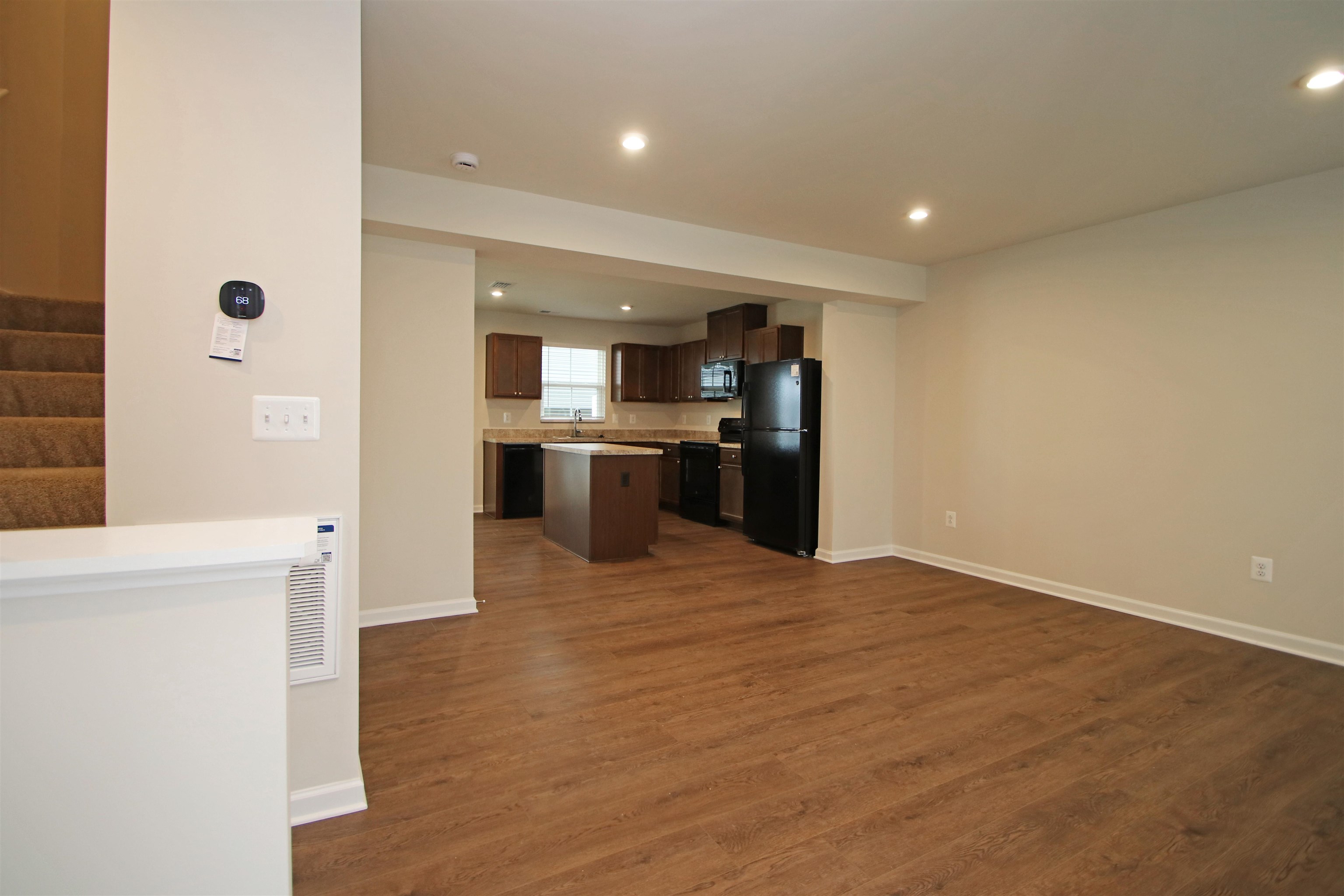 3325 Marble Loop Harrisonburg, VA 22801 - Photo 2 of 19 a view of kitchen with stainless steel appliances wooden floor and living room