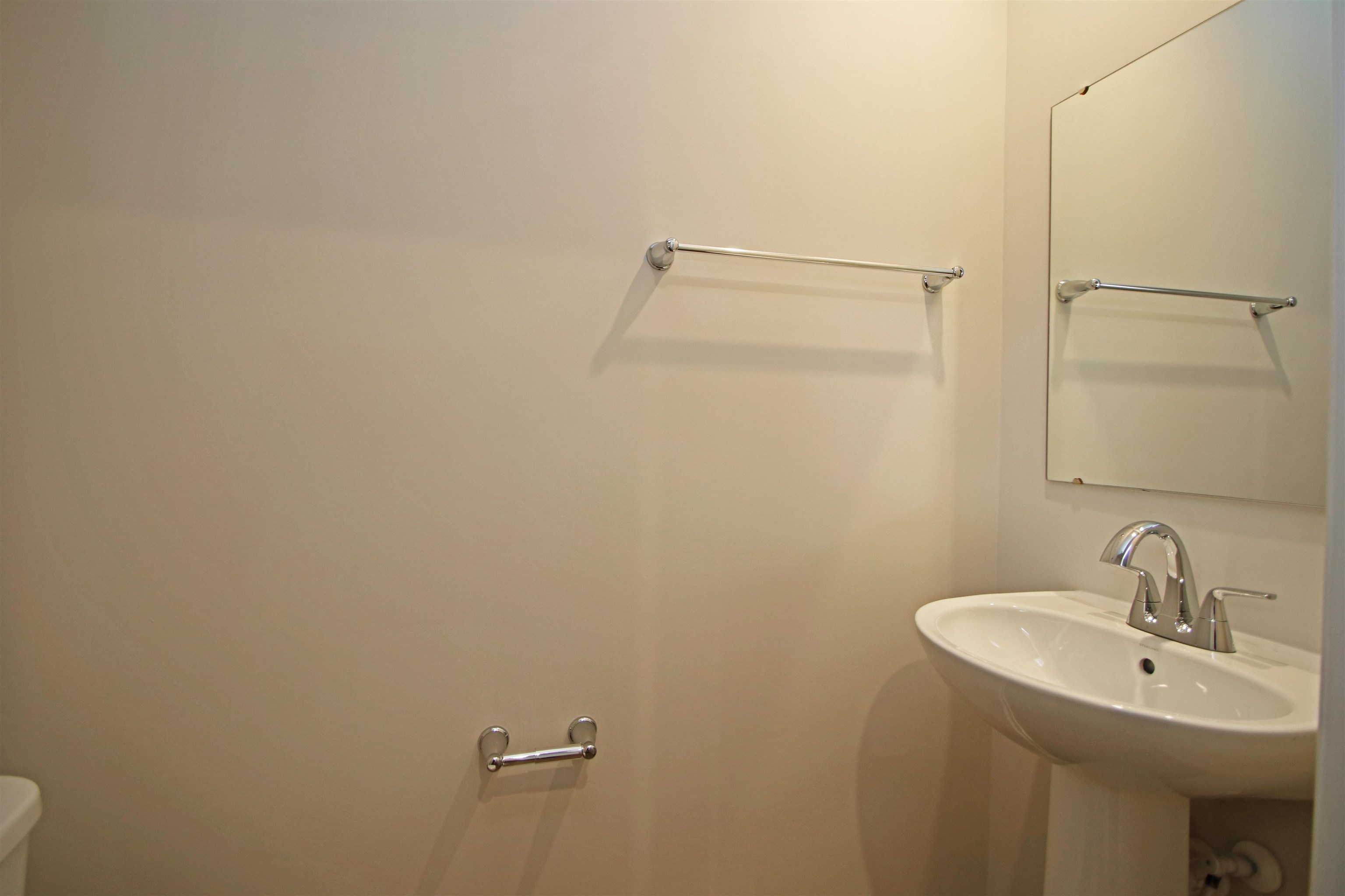 3325 Marble Loop Harrisonburg, VA 22801 - Photo 8 of 19 a bathroom with a sink and mirror
