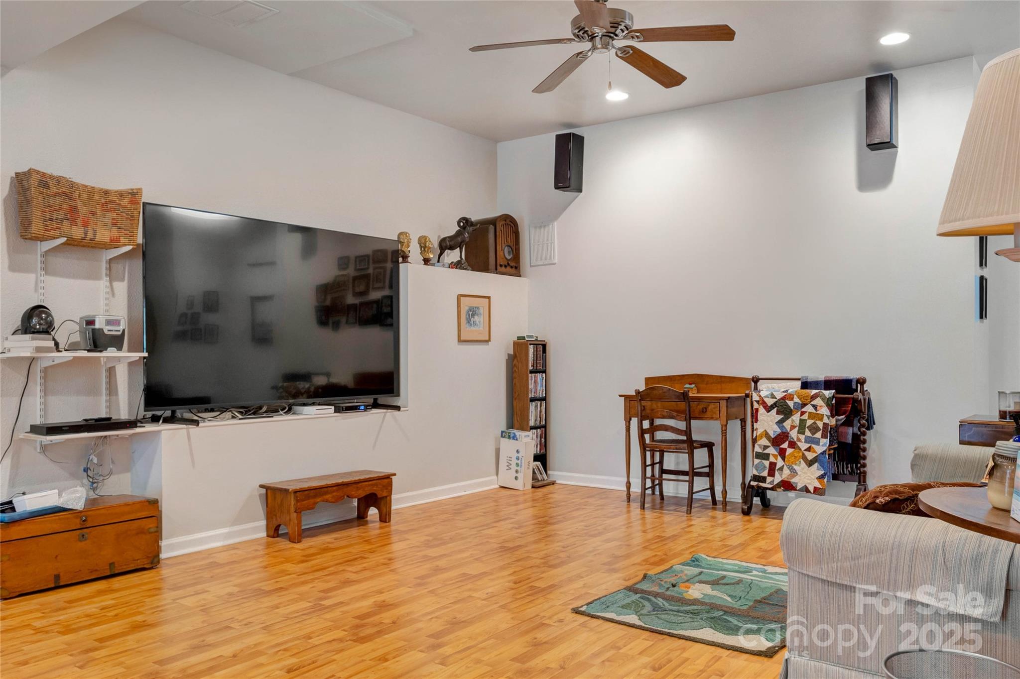 132 Lighthouse Road Mount Holly, NC 28120 - Photo 17 of 43 a living room with furniture and a flat screen tv