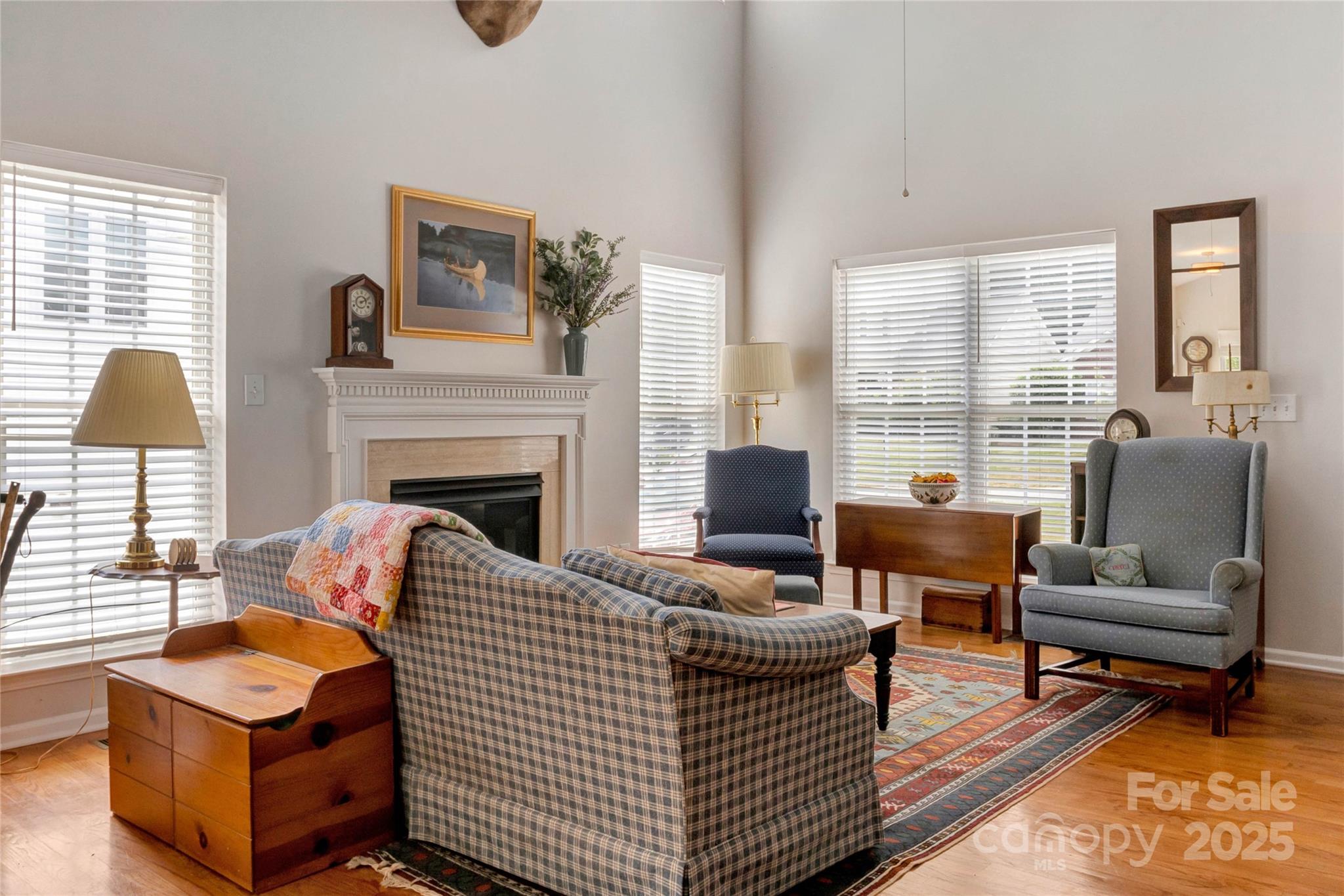 132 Lighthouse Road Mount Holly, NC 28120 - Photo 20 of 43 a living room with furniture and a fireplace