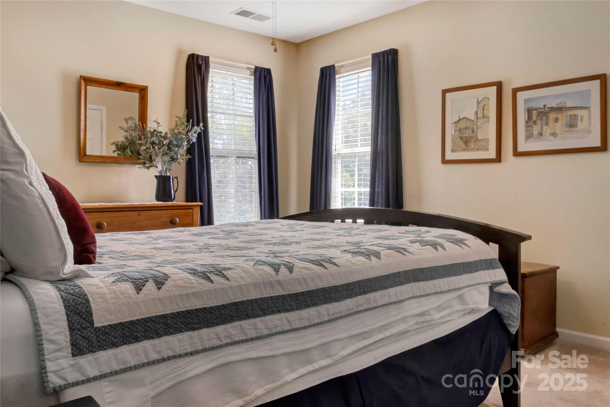 132 Lighthouse Road Mount Holly, NC 28120 - Photo 22 of 43 a bedroom with a large bed and a window