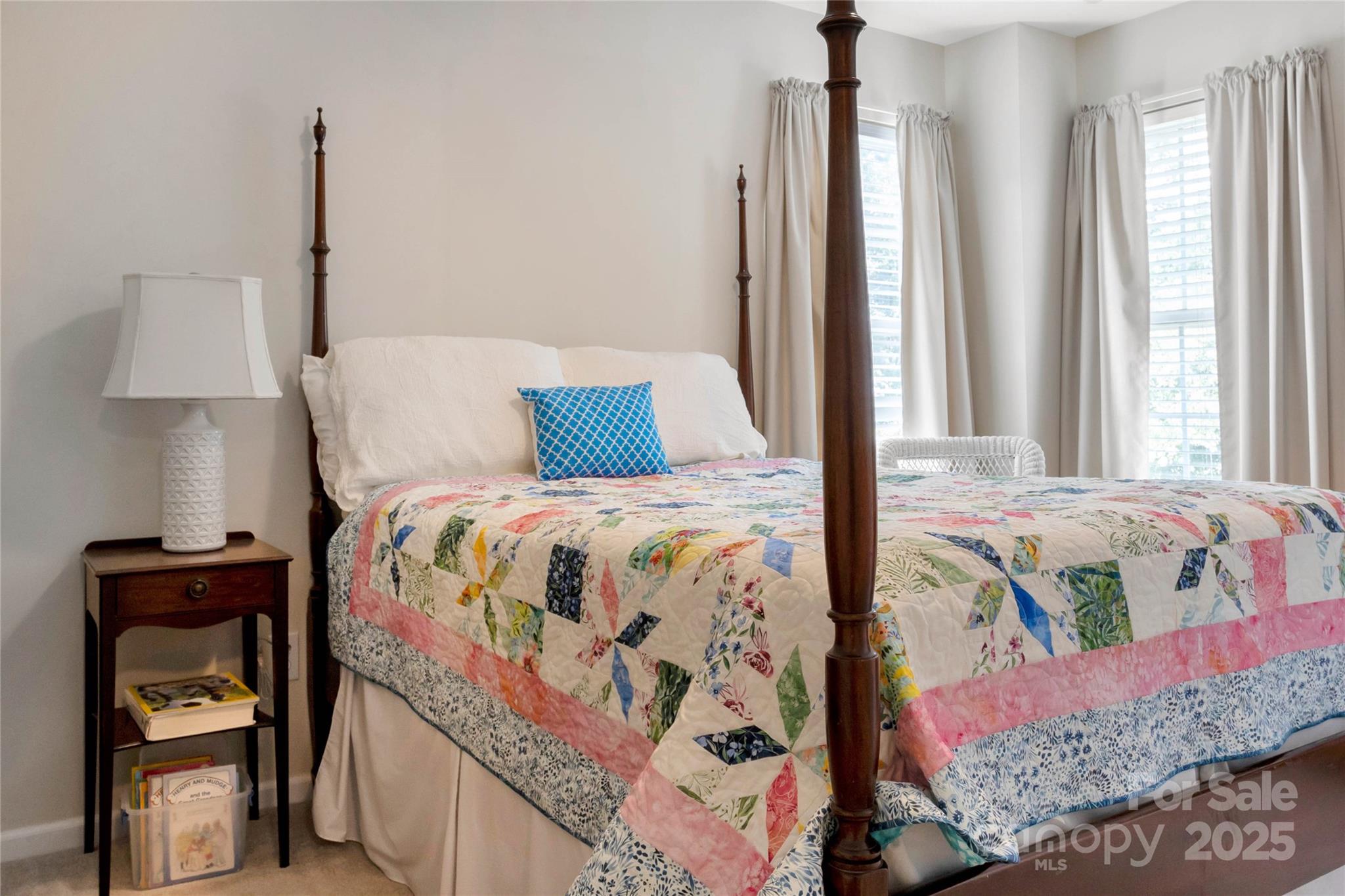 132 Lighthouse Road Mount Holly, NC 28120 - Photo 23 of 43 a bedroom with a bed and a lamp