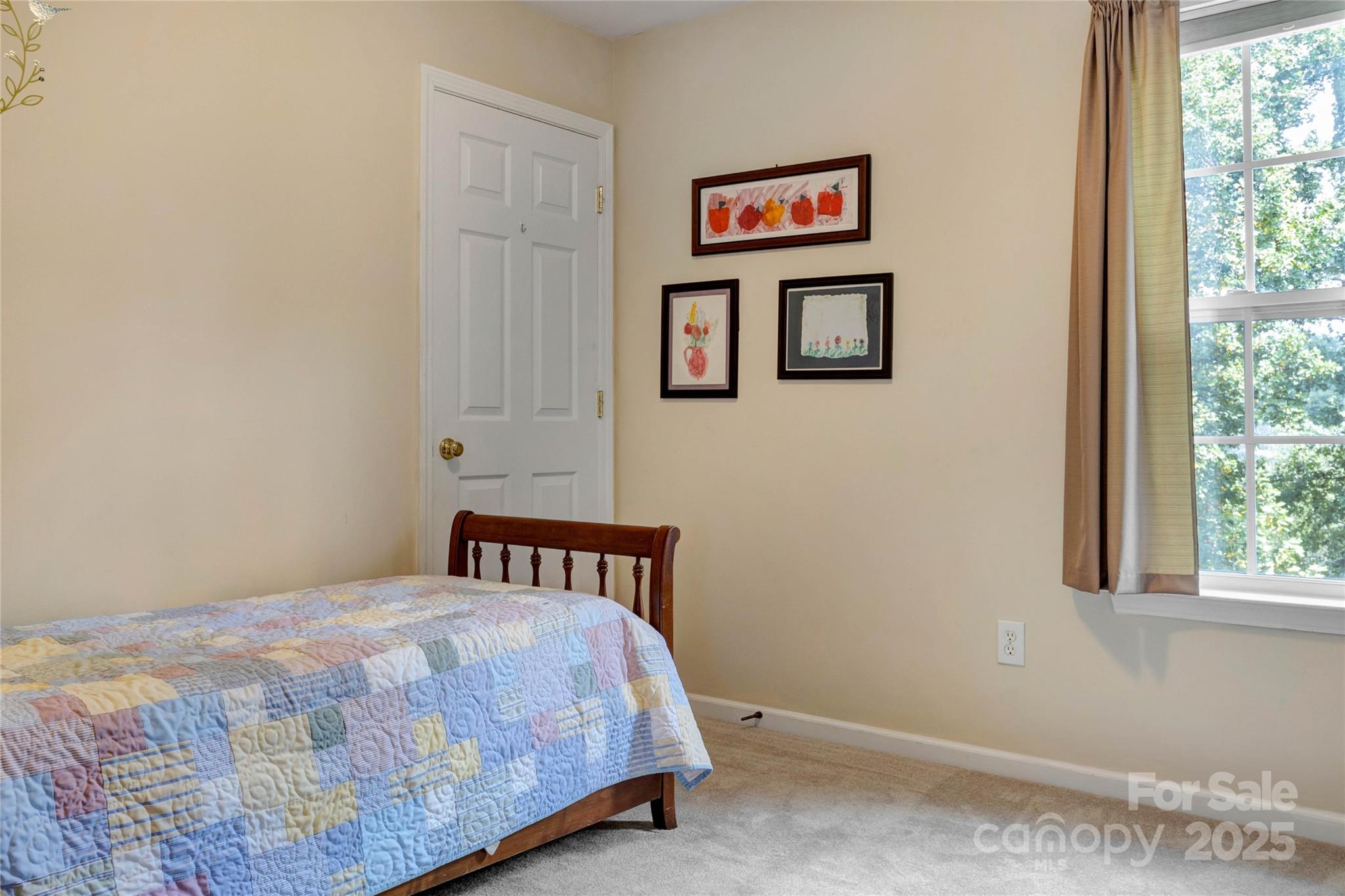 132 Lighthouse Road Mount Holly, NC 28120 - Photo 24 of 43 a bedroom with a bed and a window