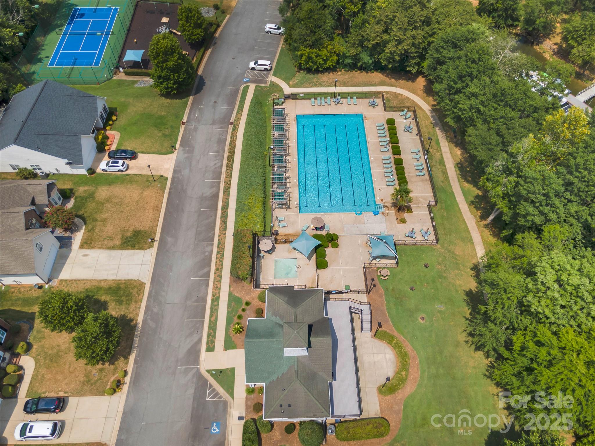 132 Lighthouse Road Mount Holly, NC 28120 - Photo 33 of 43 an aerial view of a house with a swimming pool