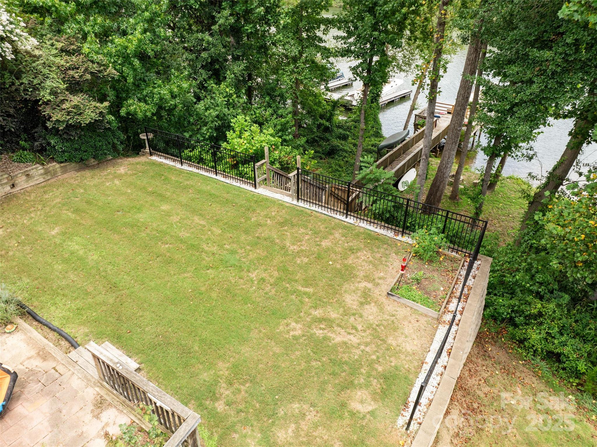 132 Lighthouse Road Mount Holly, NC 28120 - Photo 39 of 43 a view of a yard with a large tree
