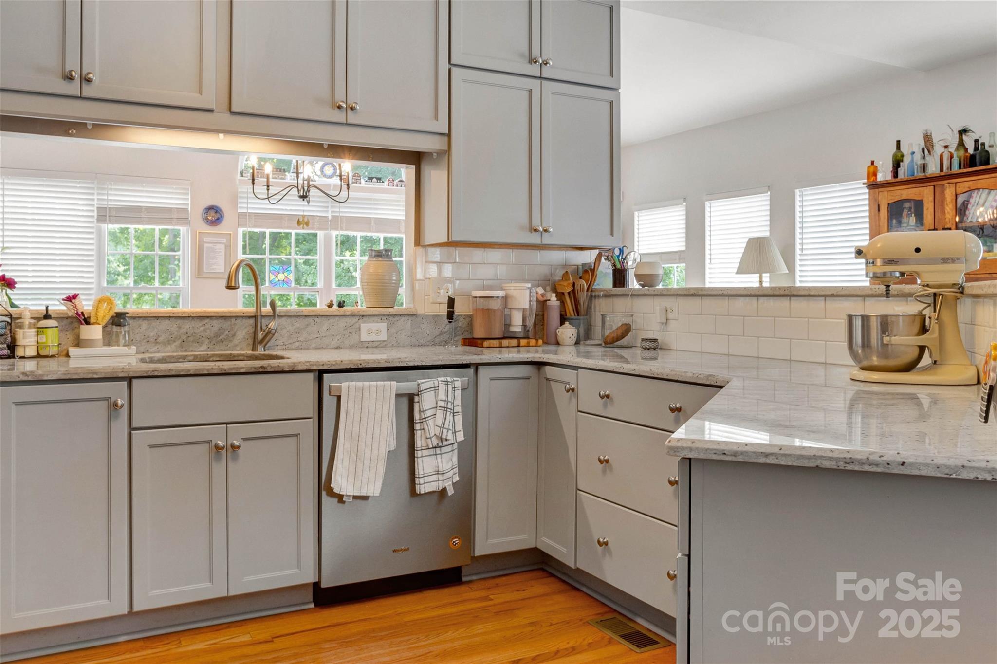 132 Lighthouse Road Mount Holly, NC 28120 - Photo 5 of 43 a kitchen with granite countertop a sink cabinets and window
